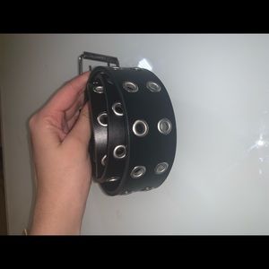 Black belt with silver holes